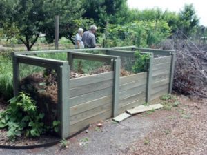 Homemade 3-compartment composting system. Photo: Lucy Bradley CC BY - 2.0